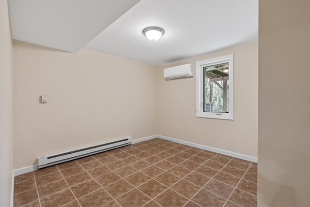 80 Emer Road, Unit 1 Marlborough, MA 01752 - Photo 7 of 11 a view of an empty room