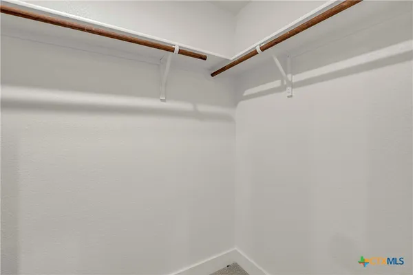 a view of a room with racks on the wall