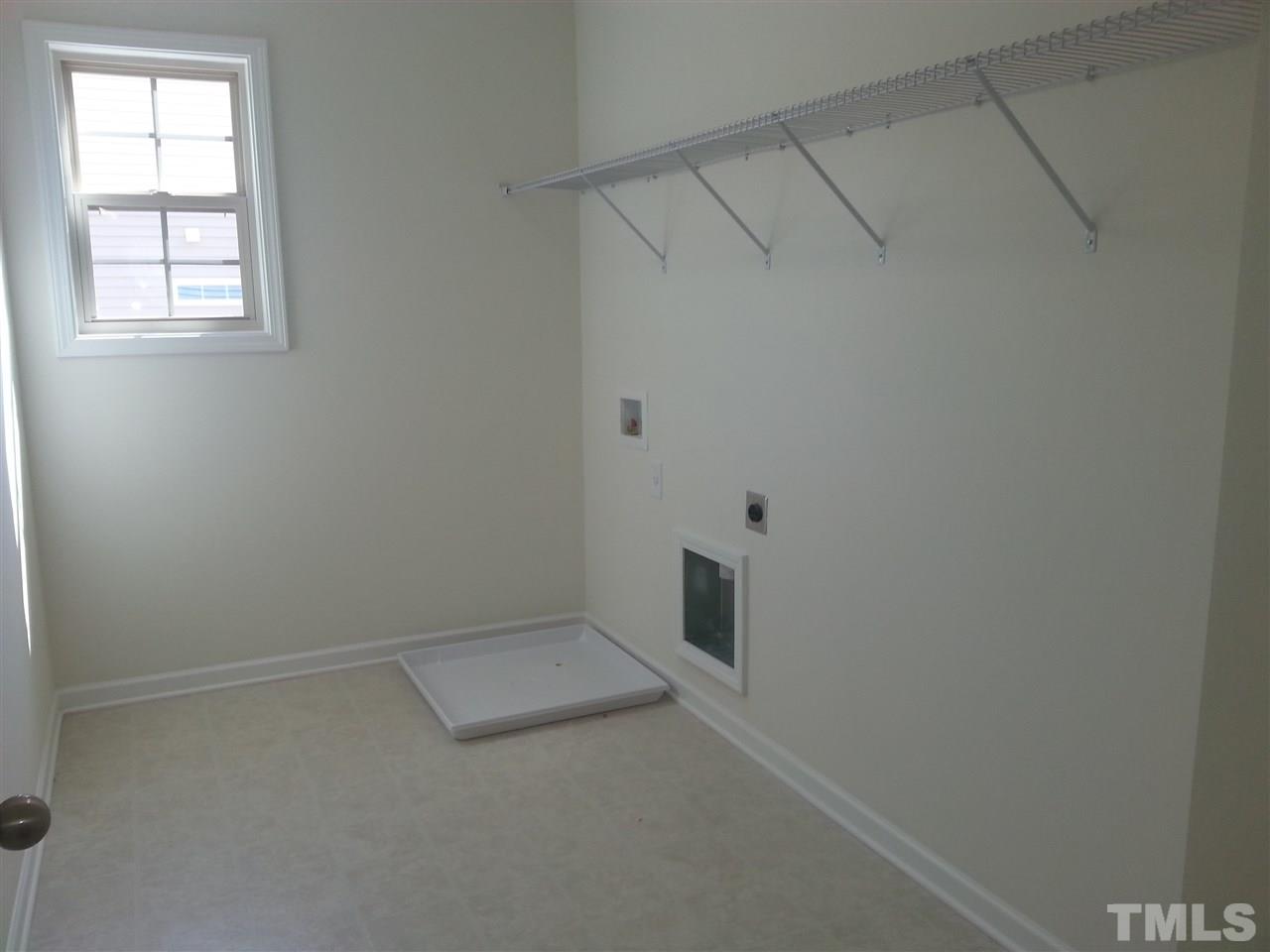 7524 Channery Way Raleigh, NC 27616 - Photo 15 of 25 an empty room with a window