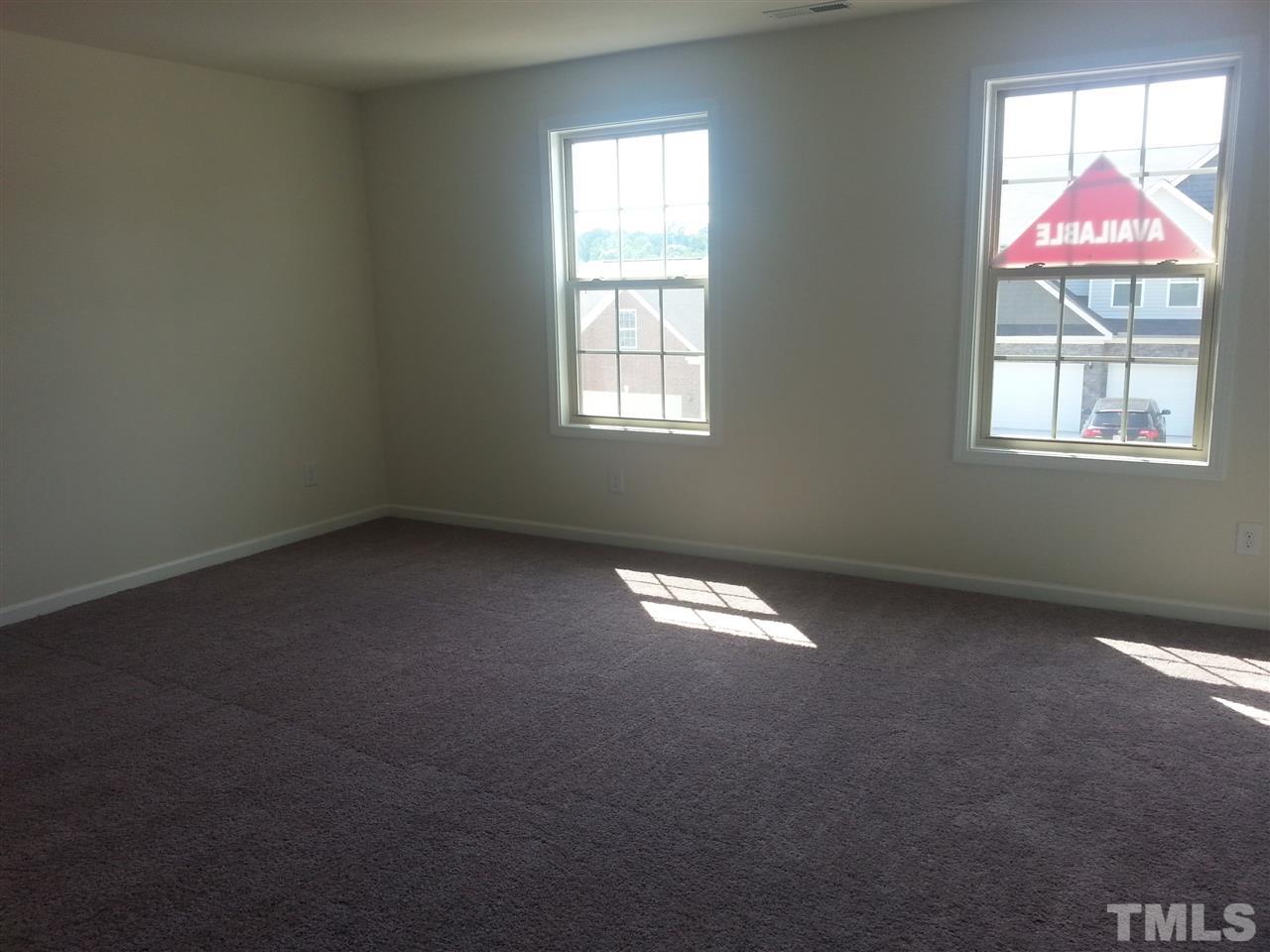7524 Channery Way Raleigh, NC 27616 - Photo 16 of 25 a view of empty room with window