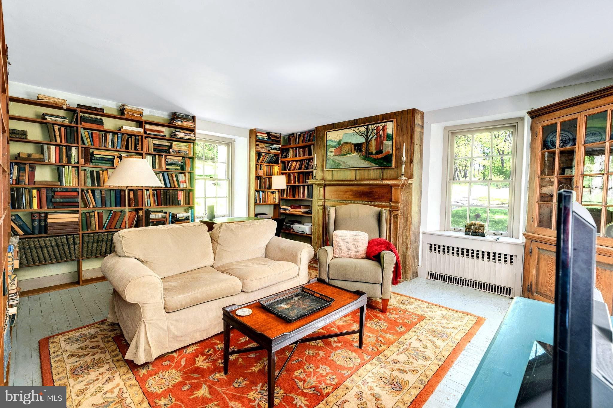 2585 Charlestown Road Phoenixville, PA 19460 - Photo 14 of 61 a living room with furniture and a floor to ceiling window