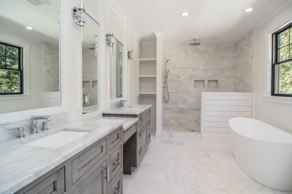 27 Littlefield Road Newton, MA 02459 - Photo 11 of 16 a bathroom with a granite countertop sink mirror and double