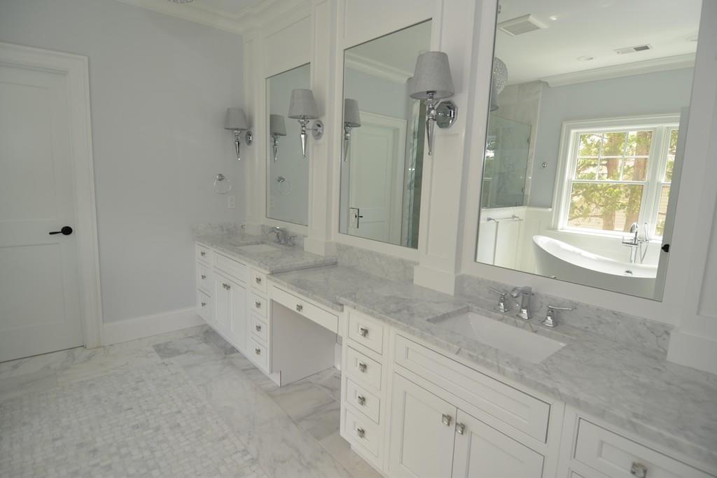 27 Littlefield Road Newton, MA 02459 - Photo 12 of 16 a spacious bathroom with double sink shower and a mirror