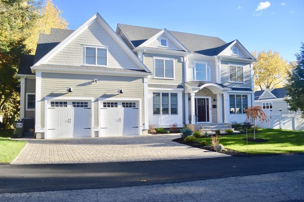 27 Littlefield Road Newton, MA 02459 - Photo 14 of 16 a front view of a house with a yard
