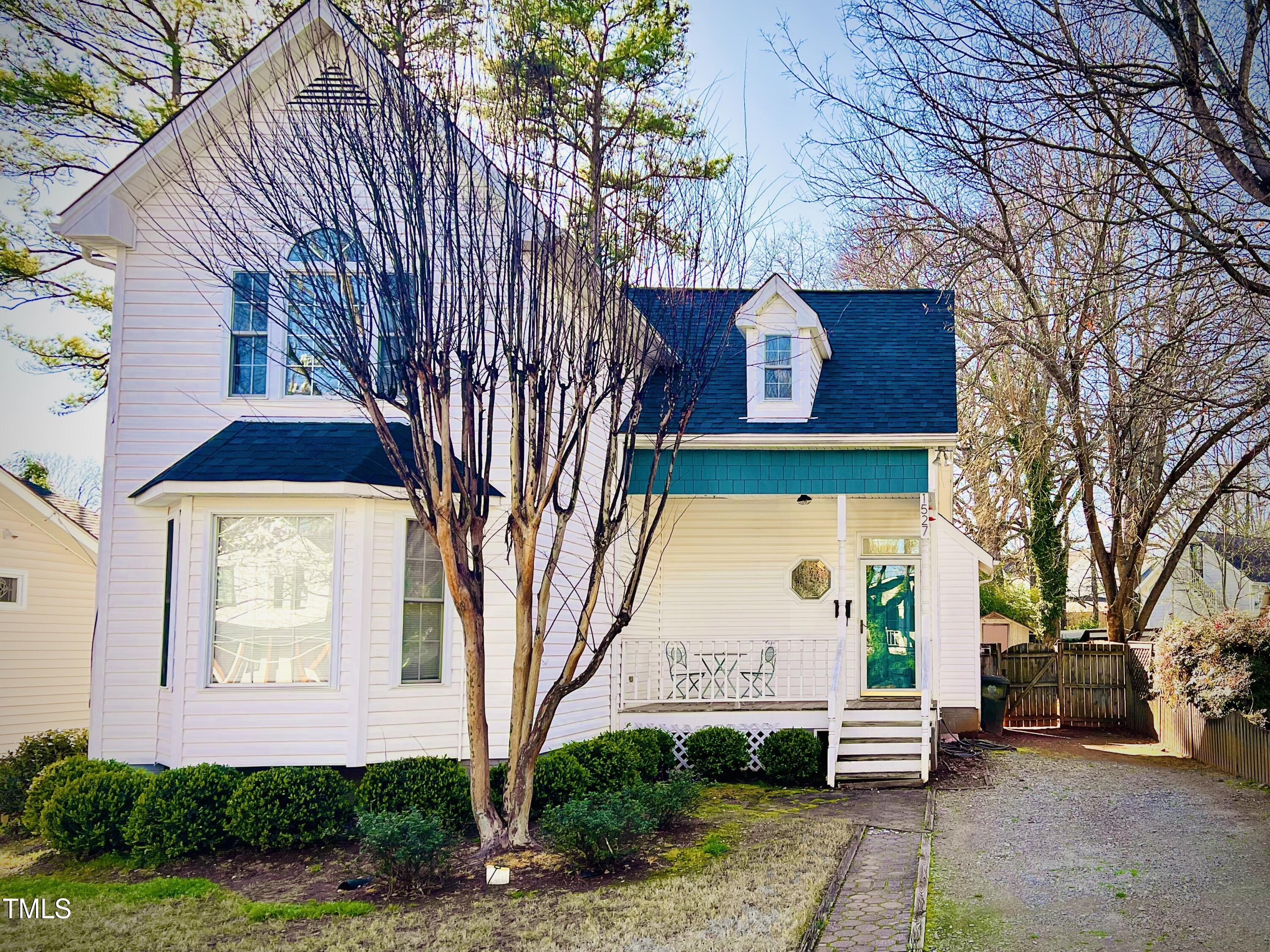 1527 Carson Street Raleigh, NC 27608 - Photo 2 of 19 Tree to bloom and grass to green soon!