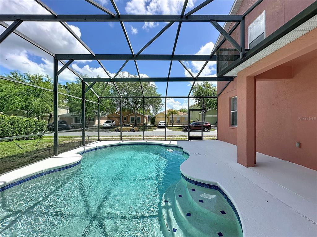 1893 Royal Ridge Drive Davenport, FL 33896 - Photo 17 of 38 a view of a backyard