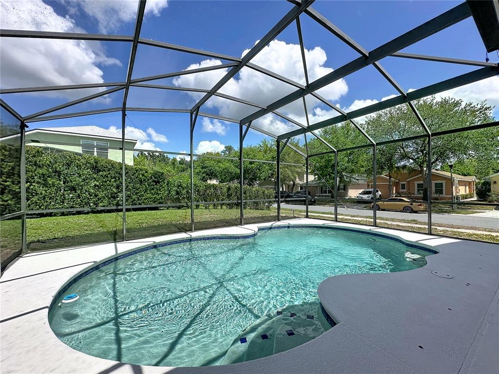 1893 Royal Ridge Drive Davenport, FL 33896 - Photo 18 of 38 a view of a backyard with swimming pool