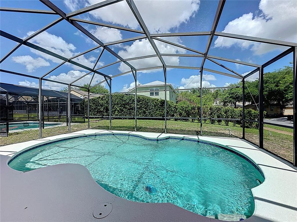 1893 Royal Ridge Drive Davenport, FL 33896 - Photo 2 of 38 a view of a backyard with swimming pool