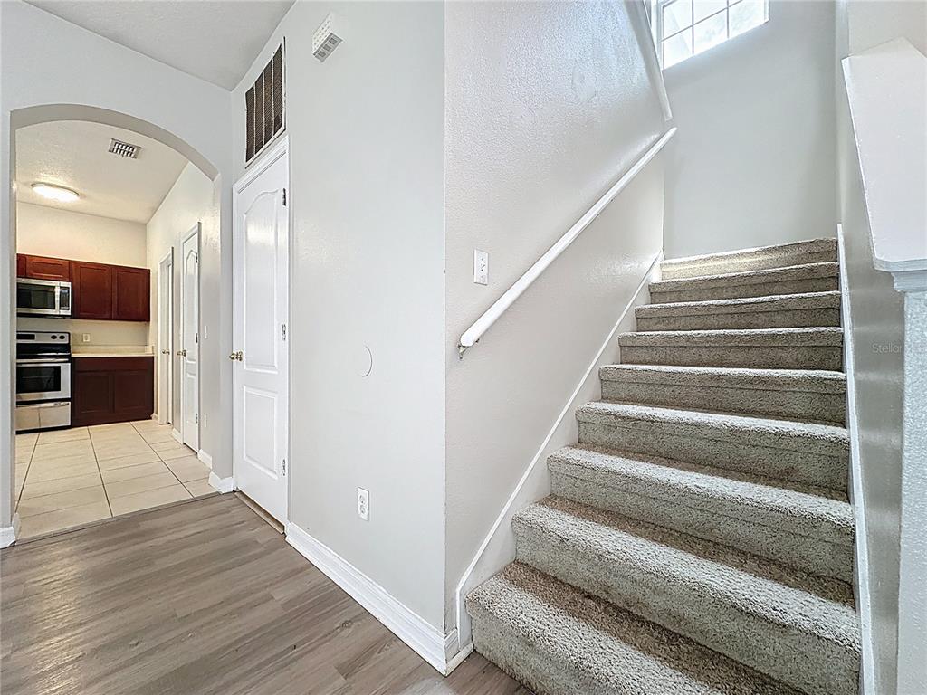 1893 Royal Ridge Drive Davenport, FL 33896 - Photo 22 of 38 a view of entryway and hall with wooden floor