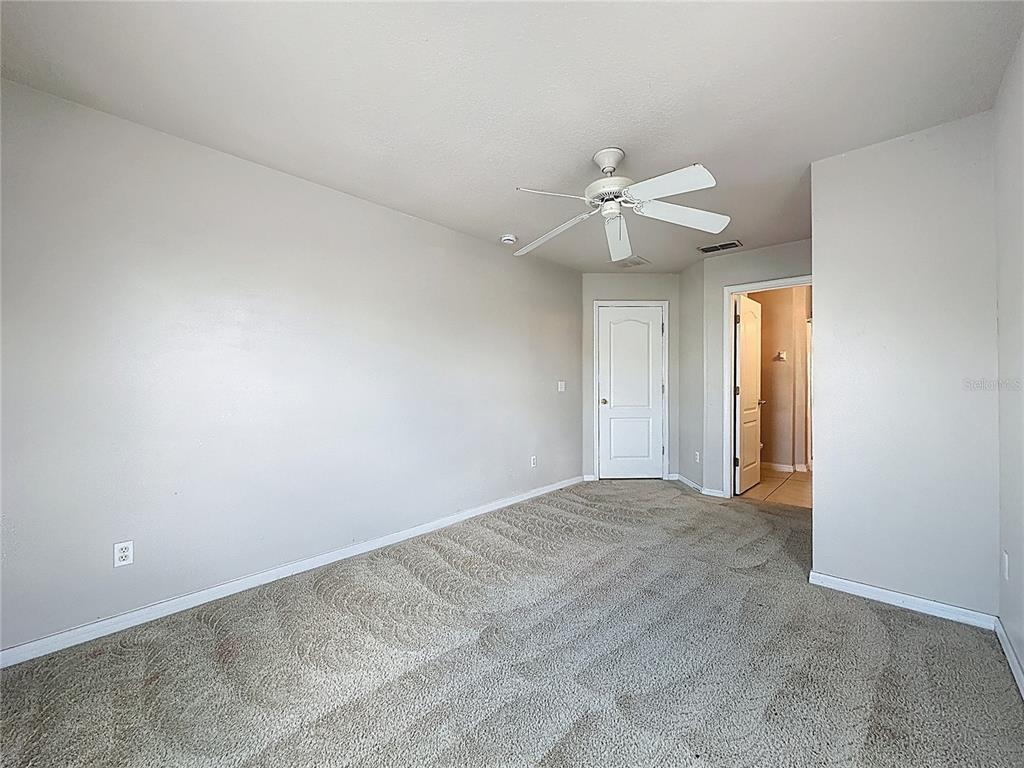 1893 Royal Ridge Drive Davenport, FL 33896 - Photo 25 of 38 a view of an empty room with a window