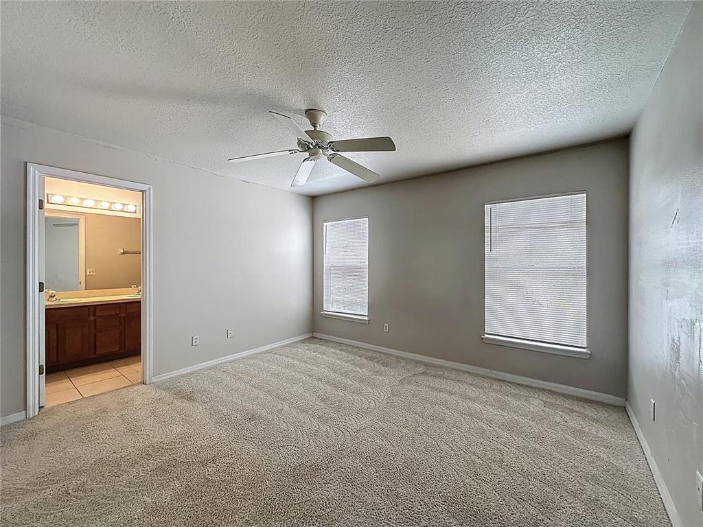 1893 Royal Ridge Drive Davenport, FL 33896 - Photo 28 of 38 a view of an empty room with a window