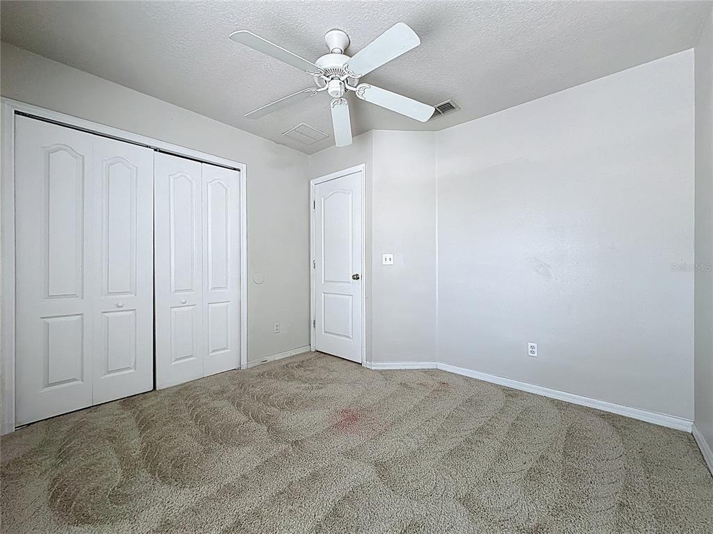 1893 Royal Ridge Drive Davenport, FL 33896 - Photo 34 of 38 a view of an empty room