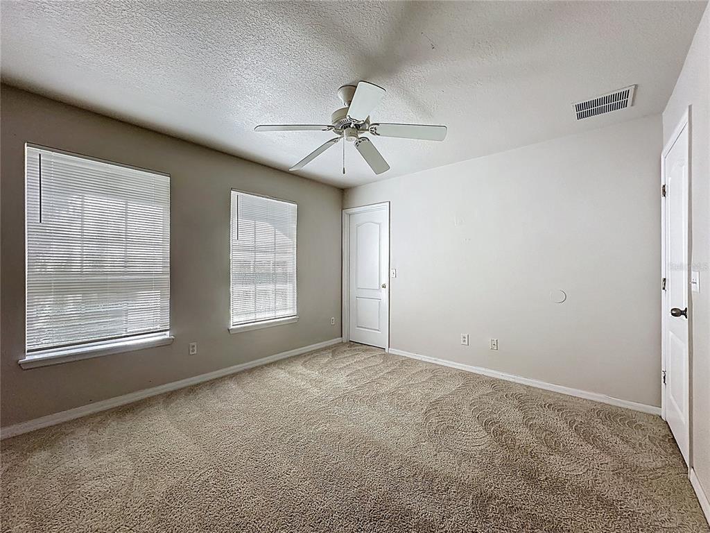 1893 Royal Ridge Drive Davenport, FL 33896 - Photo 38 of 38 a view of an empty room with a window
