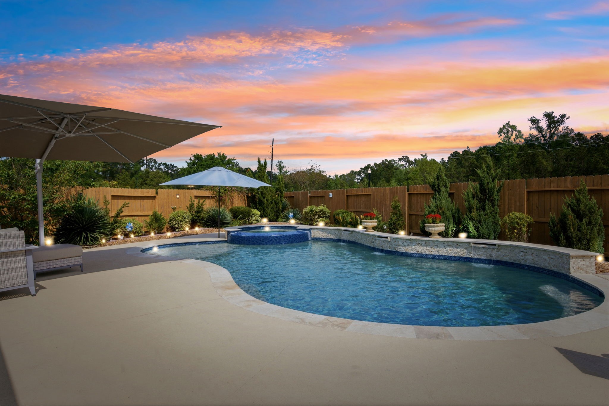 a view of a swimming pool with lounge chair