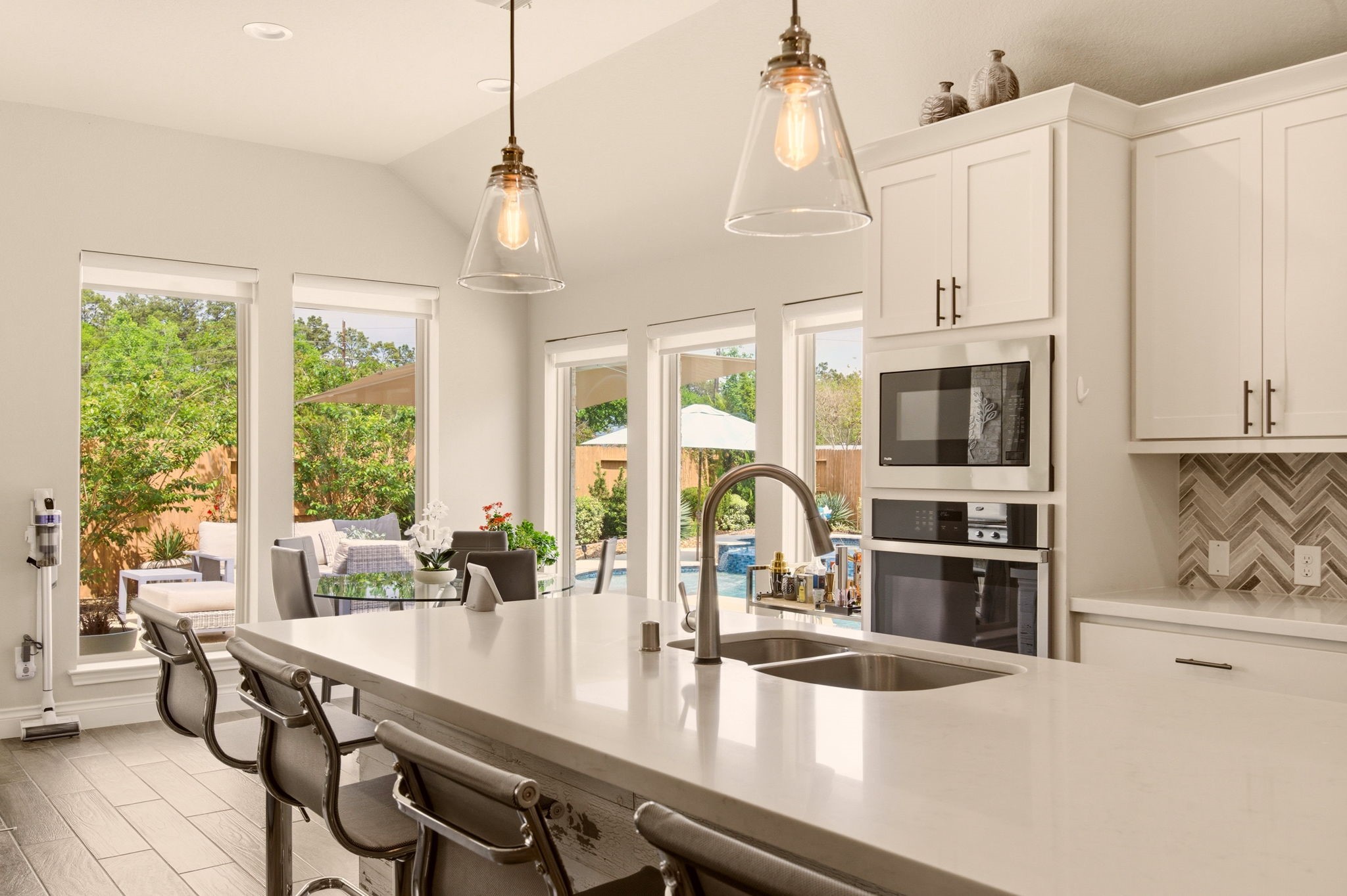 4359 Croft Creek Drive Spring, TX 77386 - Photo 18 of 46 a kitchen with stainless steel appliances a sink a stove and a window