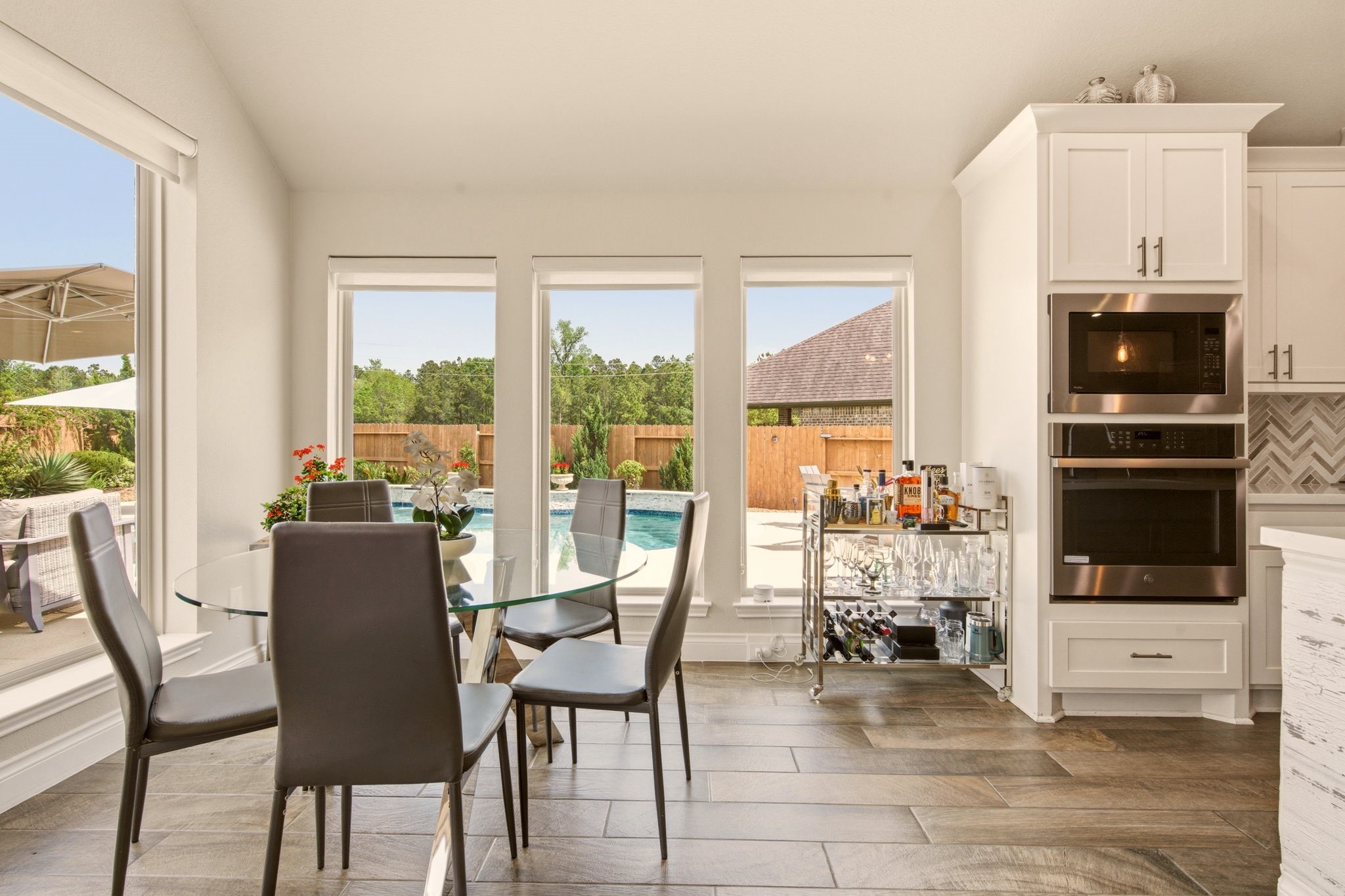 4359 Croft Creek Drive Spring, TX 77386 - Photo 19 of 46 a dining room with furniture and large windows