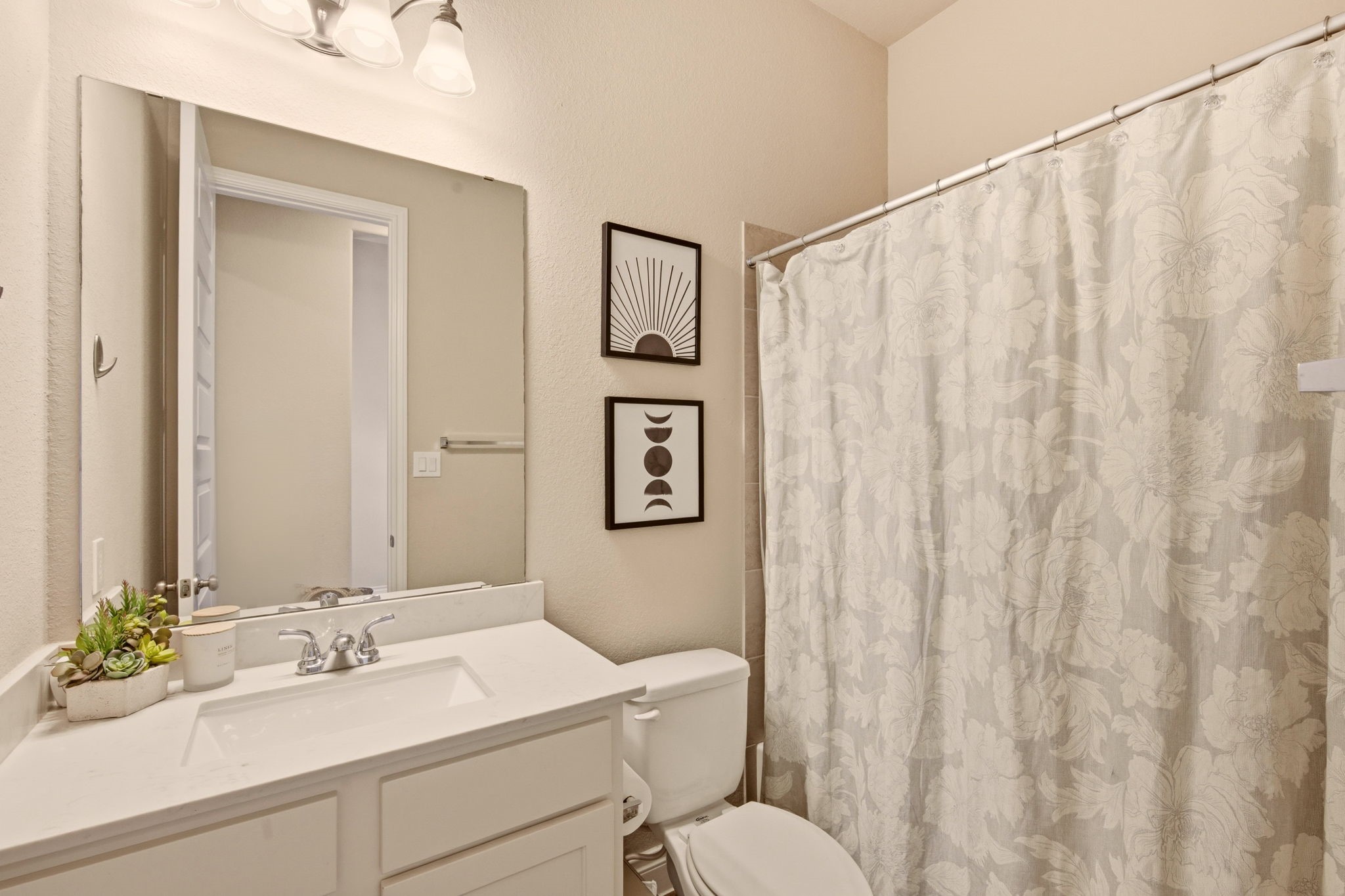 4359 Croft Creek Drive Spring, TX 77386 - Photo 21 of 46 a bathroom with a sink vanity mirror and toilet