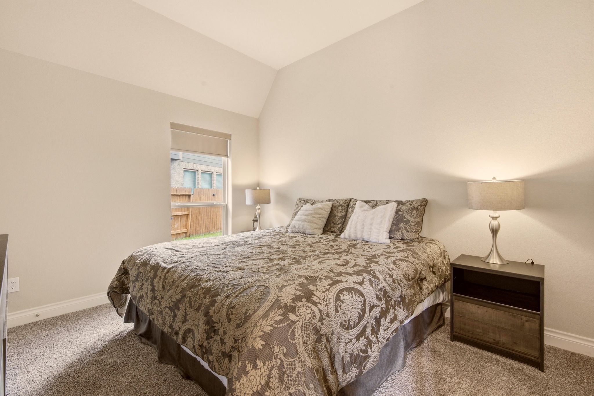 4359 Croft Creek Drive Spring, TX 77386 - Photo 22 of 46 a bedroom with a bed and a night stand