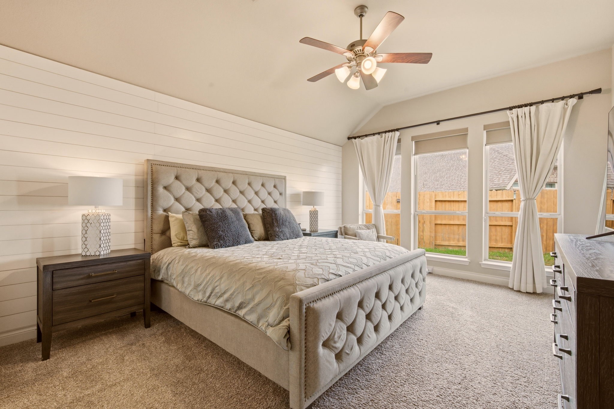 4359 Croft Creek Drive Spring, TX 77386 - Photo 26 of 46 a bedroom with a bed chandelier and a window