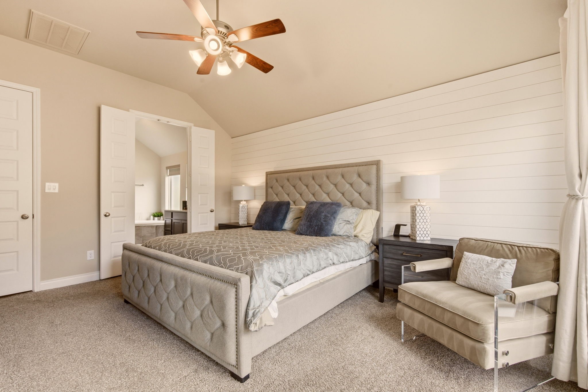 4359 Croft Creek Drive Spring, TX 77386 - Photo 27 of 46 a bedroom with a bed couch and a ceiling fan