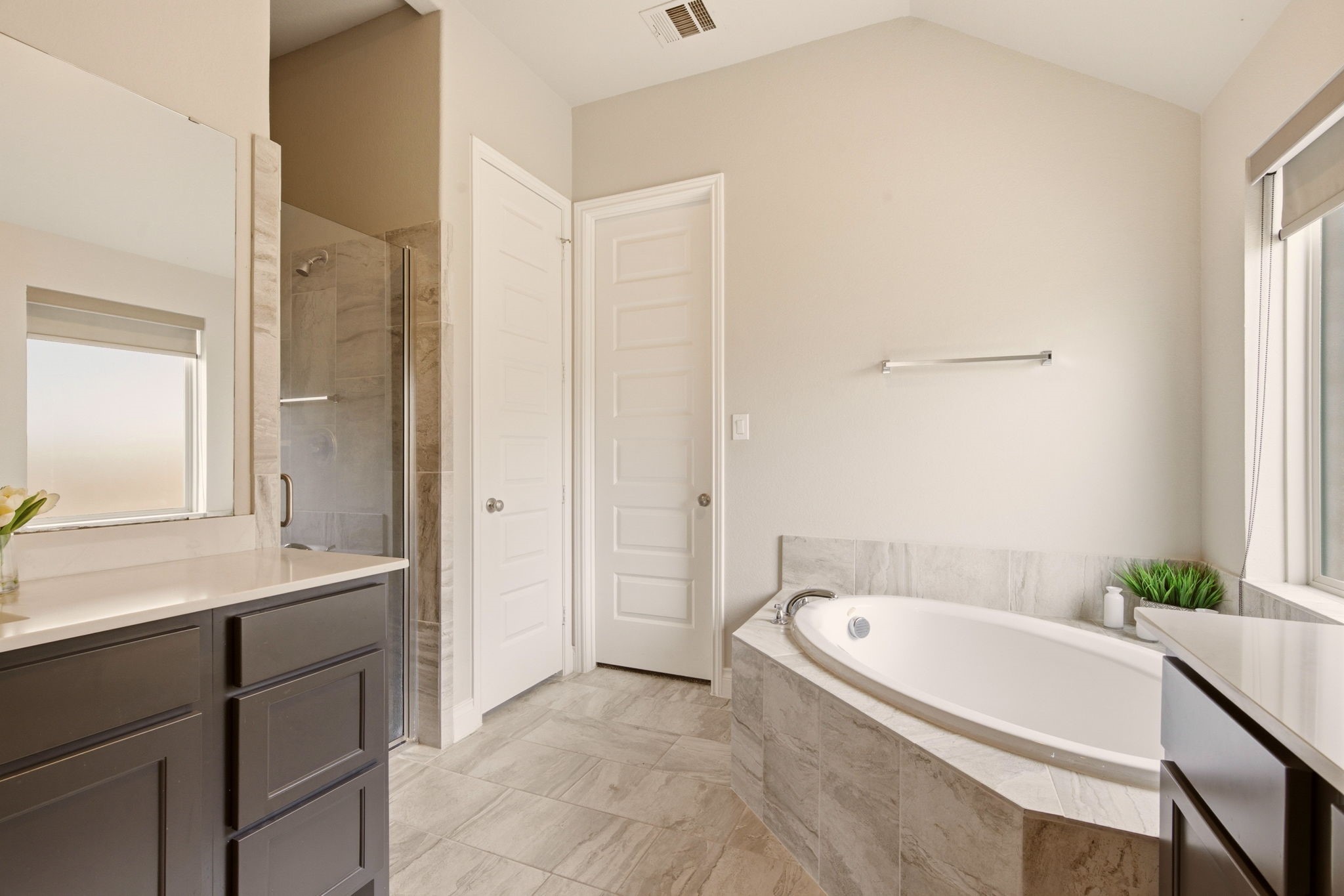 4359 Croft Creek Drive Spring, TX 77386 - Photo 30 of 46 a bathroom with a tub sink and mirror