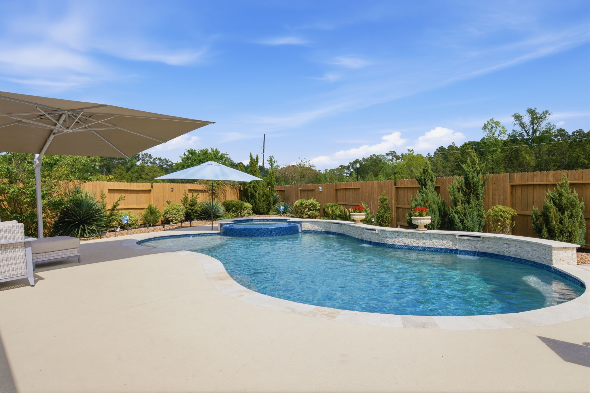 4359 Croft Creek Drive Spring, TX 77386 - Photo 35 of 46 a view of a swimming pool and trees in the background