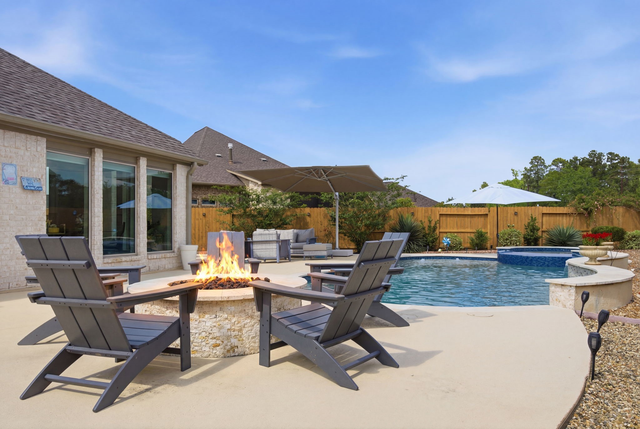 4359 Croft Creek Drive Spring, TX 77386 - Photo 36 of 46 a view of a backyard with swimming pool and sitting area