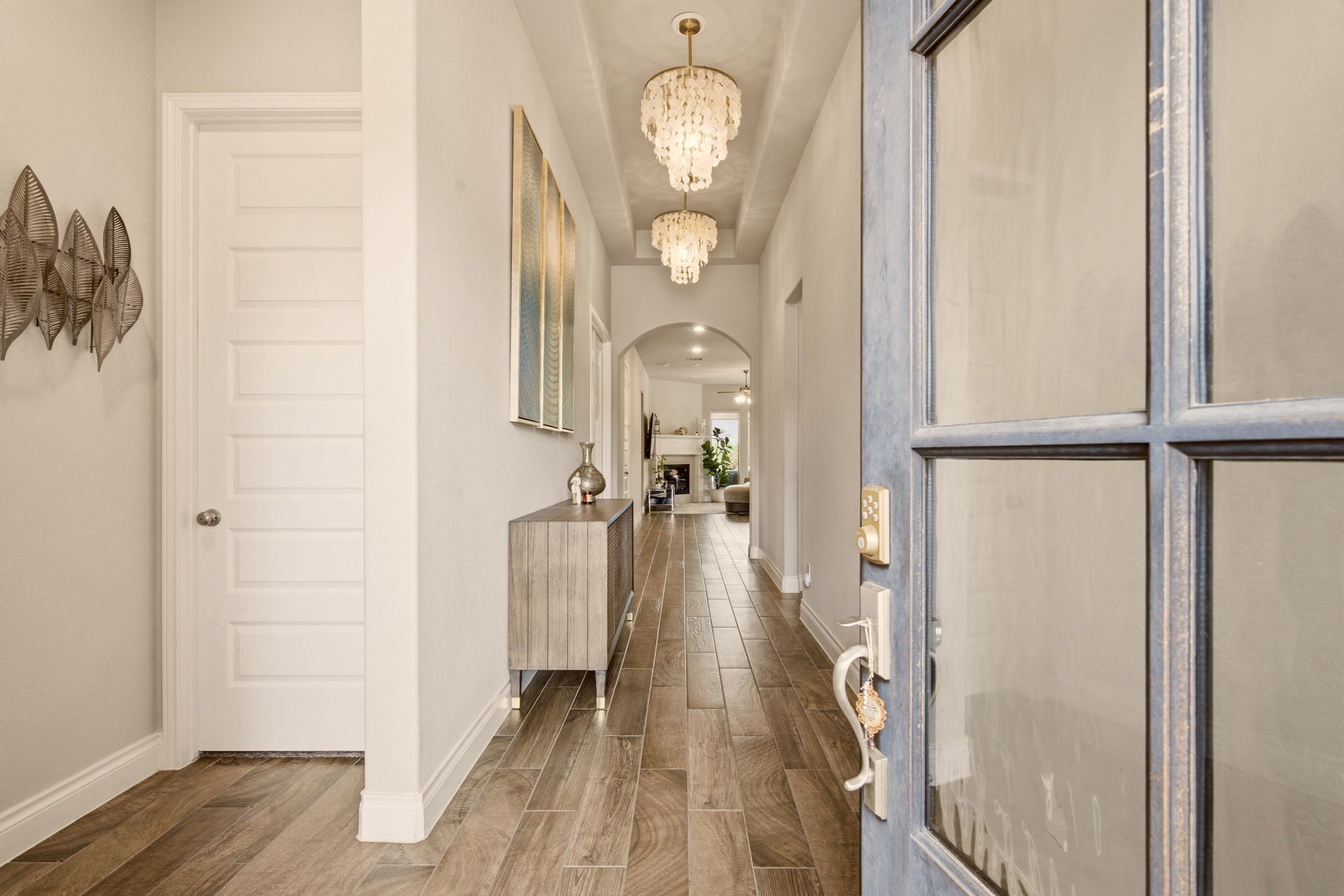 4359 Croft Creek Drive Spring, TX 77386 - Photo 5 of 46 a view of a hallway with wooden floor and staircase
