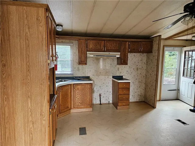 a bathroom with a sink and a shower