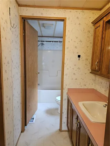 a bathroom with a sink and a tub