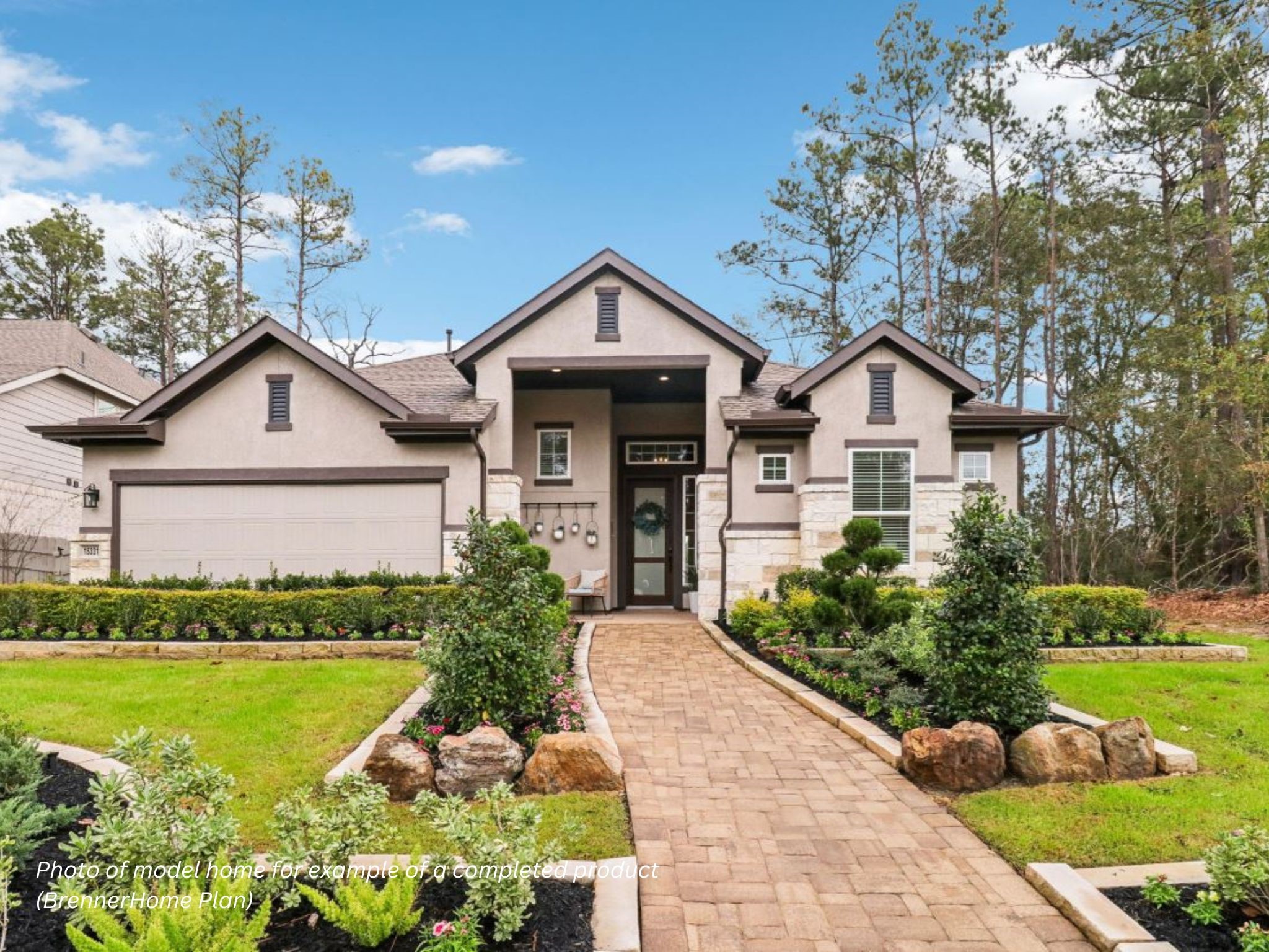 16851 Deep Wingbeat Way Magnolia, TX 77354 - Photo 1 of 10 a front view of a house with a yard and lake view