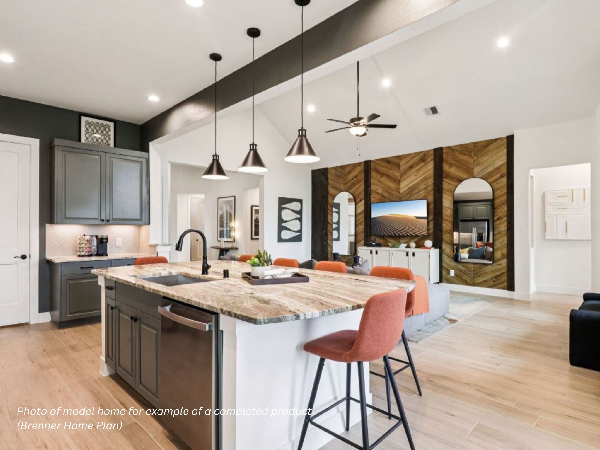 16851 Deep Wingbeat Way Magnolia, TX 77354 - Photo 2 of 10 a kitchen with stainless steel appliances granite countertop a sink stove and cabinets
