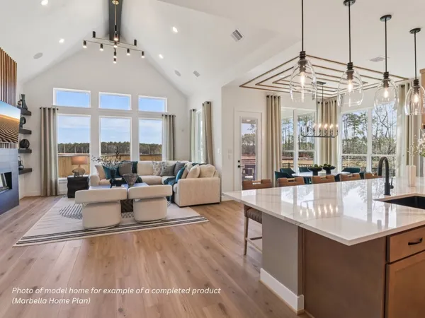 a very nice looking living room with a large window