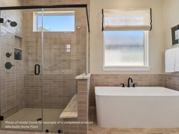a bathroom with a sink a mirror and shower