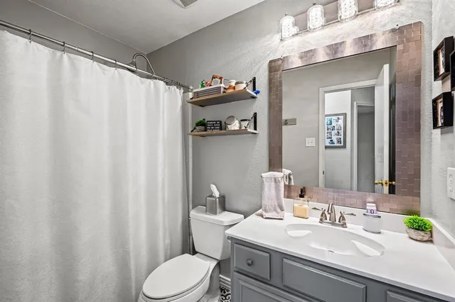 a room with furniture and workspace