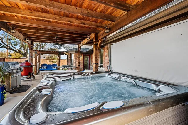 a house view with wooden fence