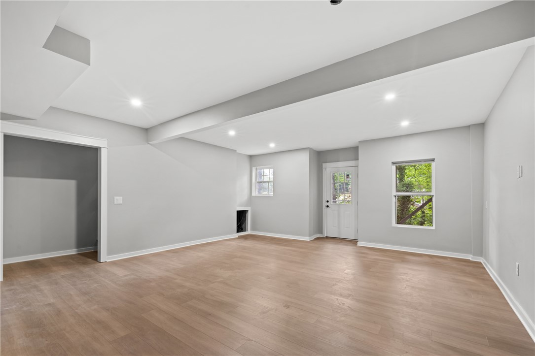 309 Woodland Way Clemson, SC 29631 - Photo 26 of 43 This versatile open-concept space offers bright illumination and durable flooring for endless possibilities.
