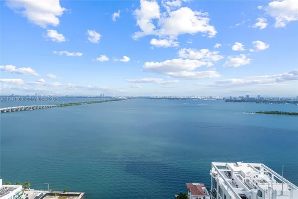 a view of a lake from a yard