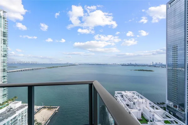 a view of a lake from a balcony
