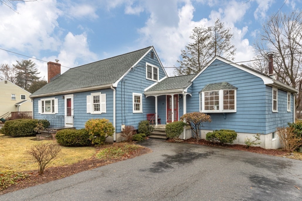 17 Sturges Road Reading, MA 01867 - Photo 1 of 29 a front view of a house with a yard