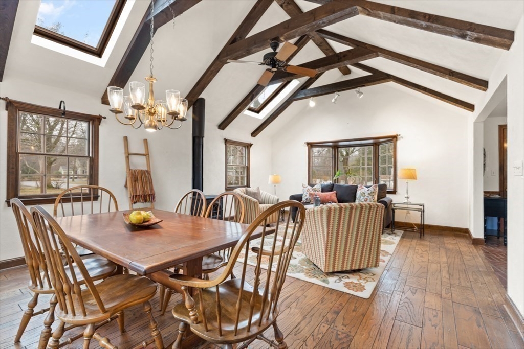 17 Sturges Road Reading, MA 01867 - Photo 15 of 29 a view of a dining room with furniture and wooden floor