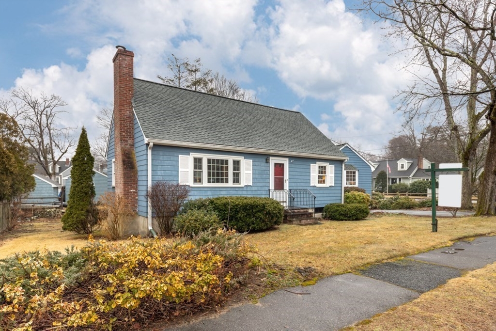 17 Sturges Road Reading, MA 01867 - Photo 3 of 29 a front view of a house with a yard