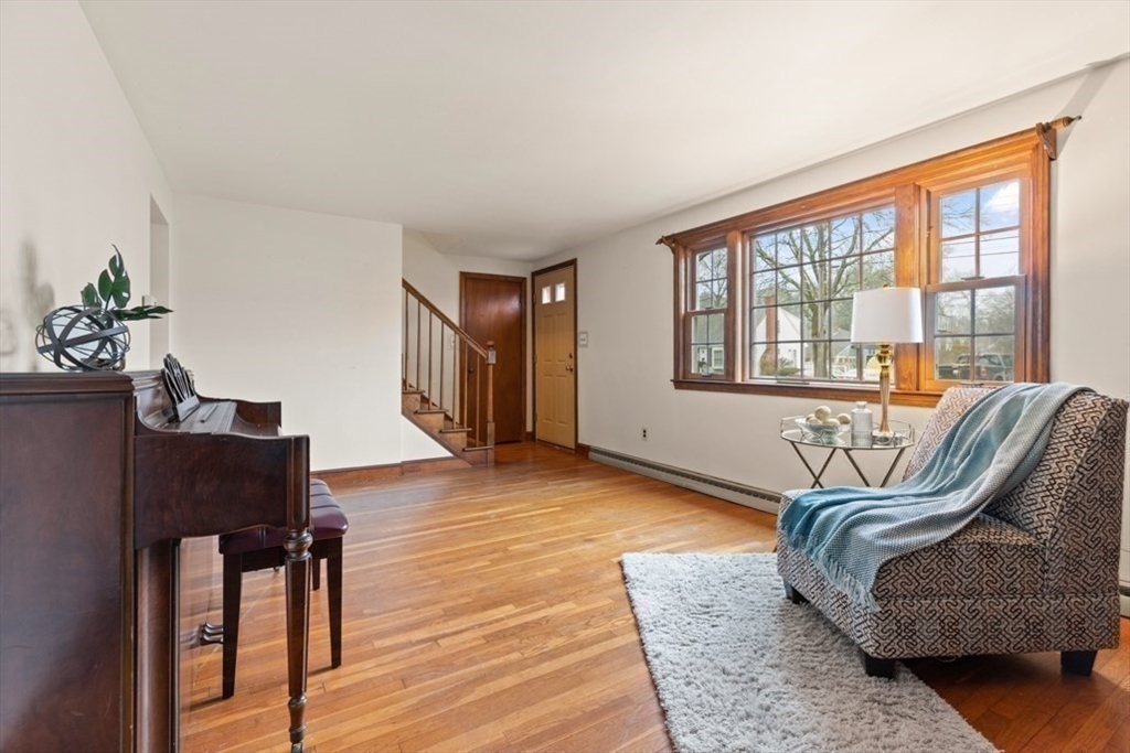 17 Sturges Road Reading, MA 01867 - Photo 7 of 29 a living room with furniture and a window