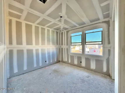 an empty room with windows