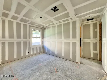 an empty room with windows