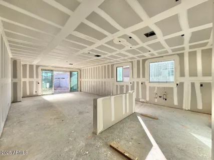 an empty room with windows