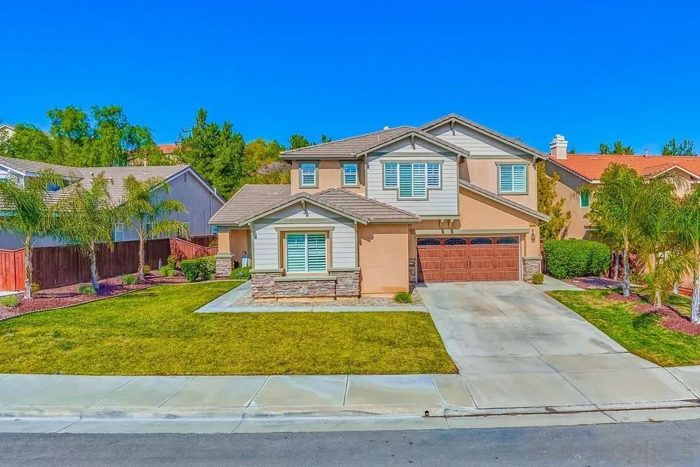 32758 Stonefield Lane Temecula, CA 92592 - Photo 2 of 30 a front view of a house with a yard
