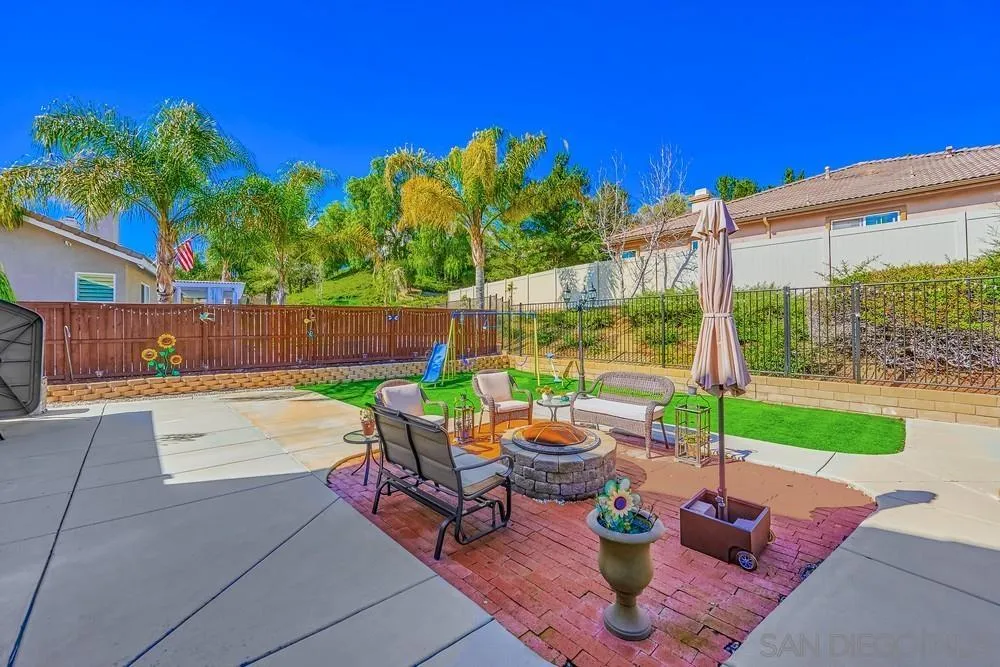 32758 Stonefield Lane Temecula, CA 92592 - Photo 28 of 30 a view of a backyard with sitting area