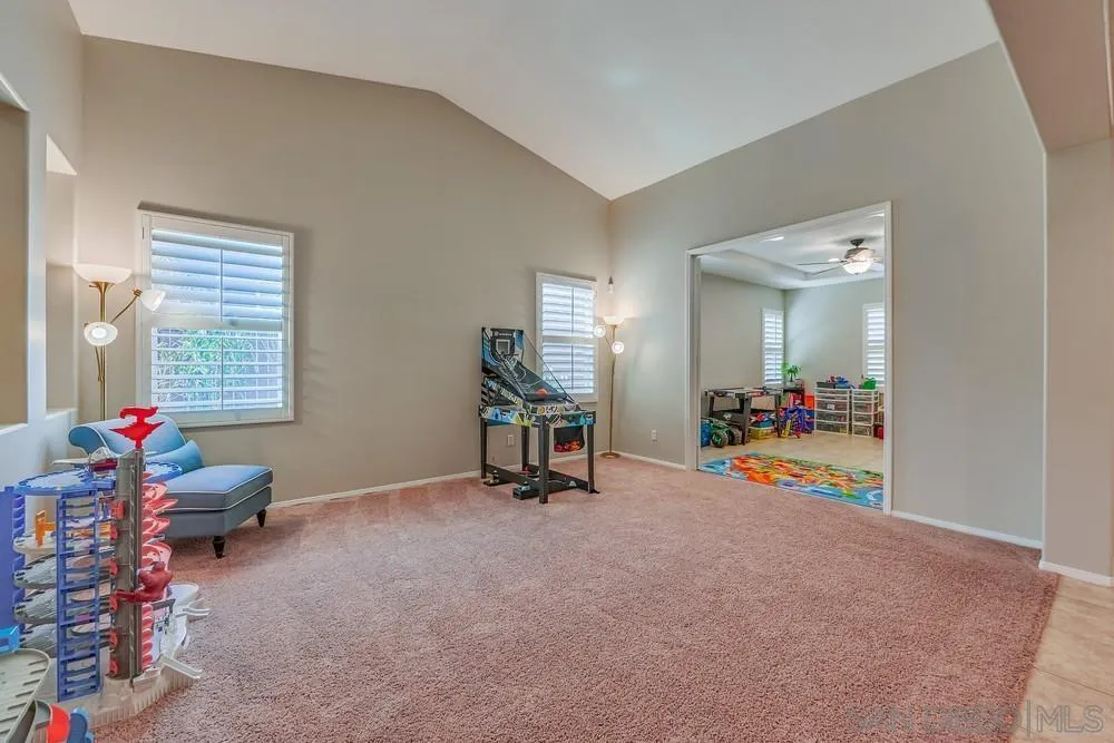 32758 Stonefield Lane Temecula, CA 92592 - Photo 9 of 30 a view of a livingroom with furniture and a window