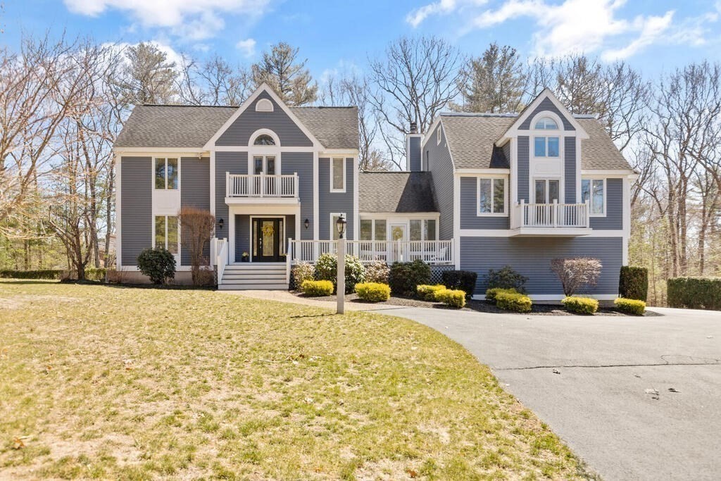 18 Appleton Lane Boxford, MA 01921 - Photo 2 of 42 a front view of a house with a yard